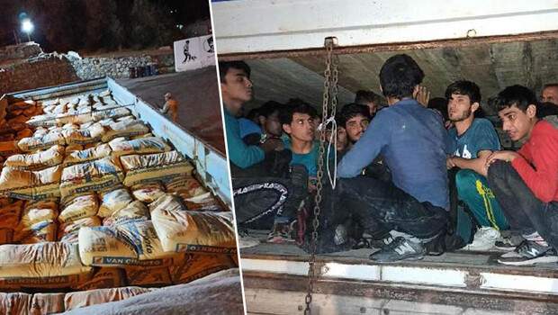 Kamyon kasasındaki çimento torbalarının altından 78 kaçak göçmen çıktı